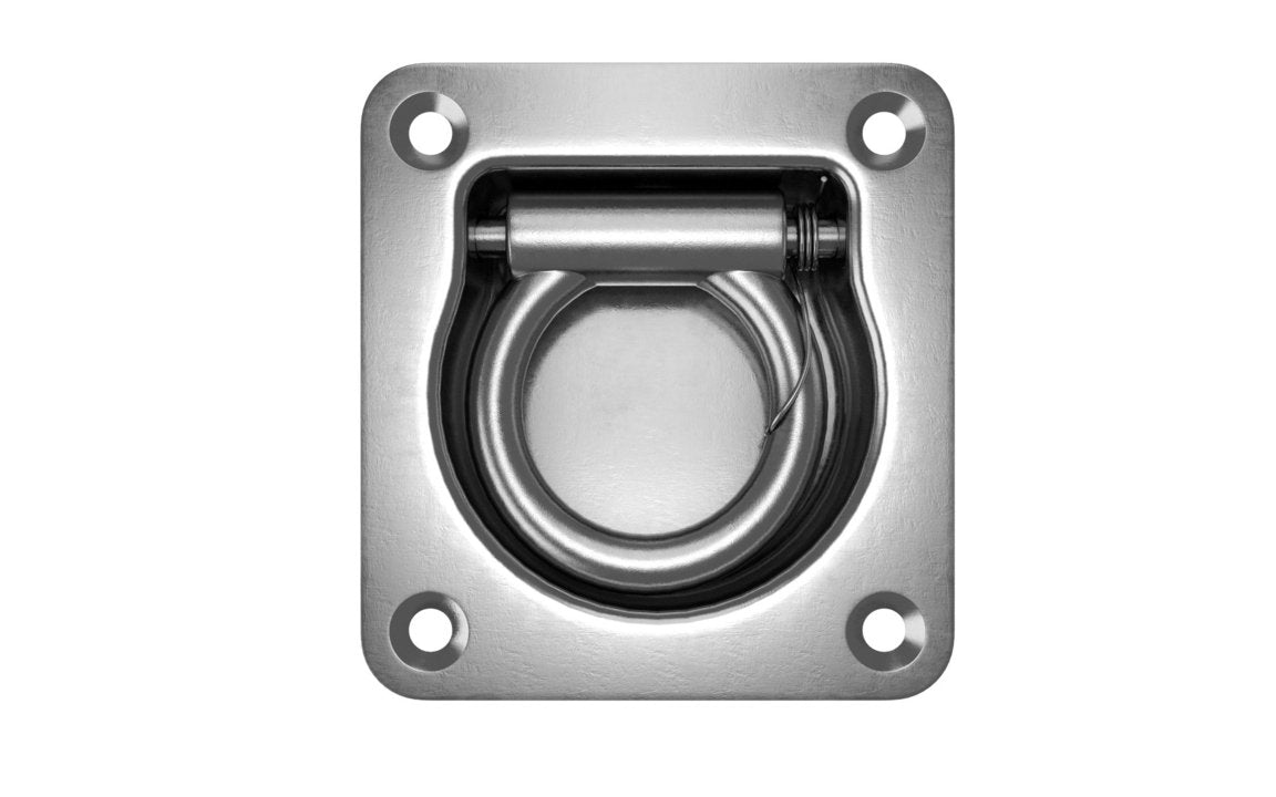A zinc plated, mild steel lashing ring with a recessed design mounted on a flat surface.