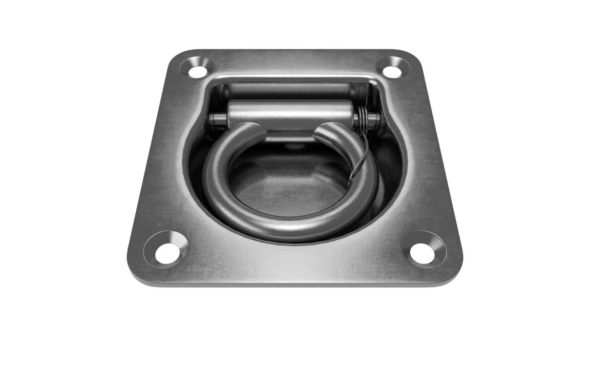 A zinc plated, mild steel lashing ring with a recessed design mounted on a flat surface.