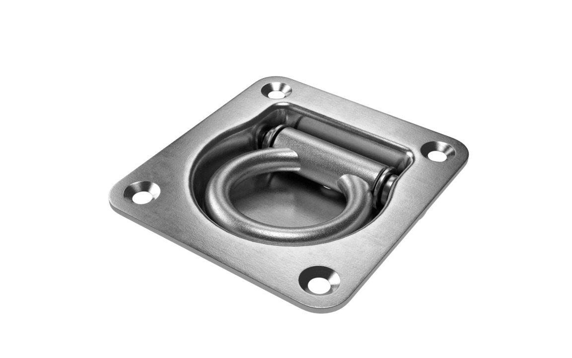 A zinc plated, mild steel lashing ring with a recessed design mounted on a flat surface.
