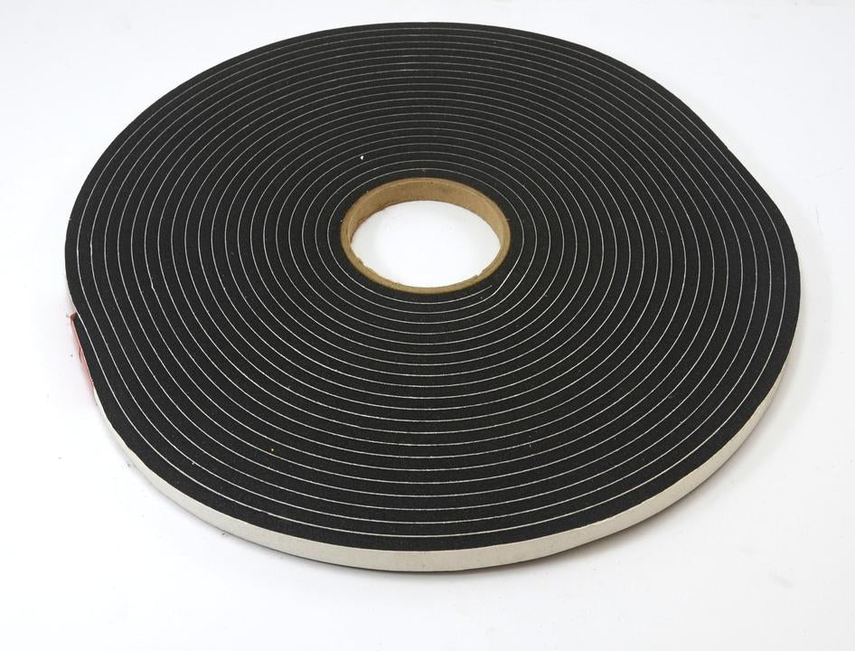 A roll of black foam tape on a white background.