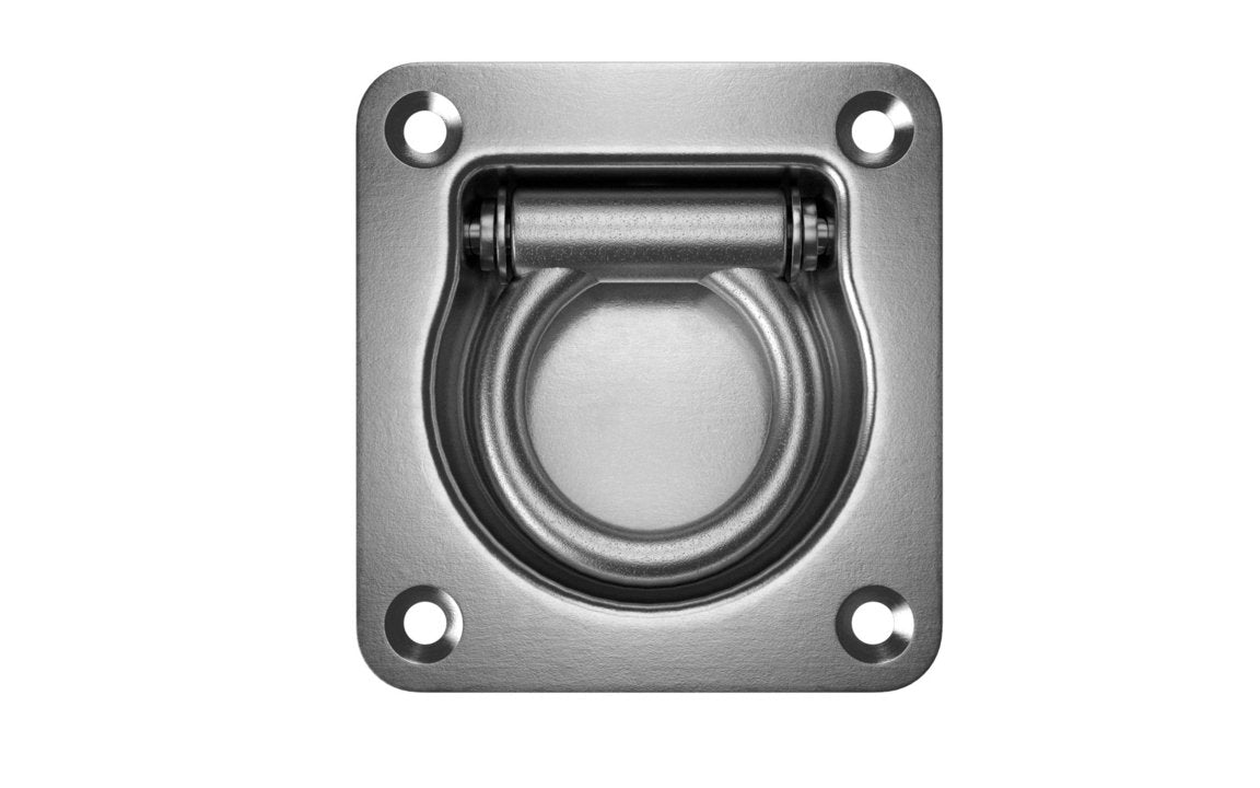 A zinc plated, mild steel lashing ring with a recessed design mounted on a flat surface.